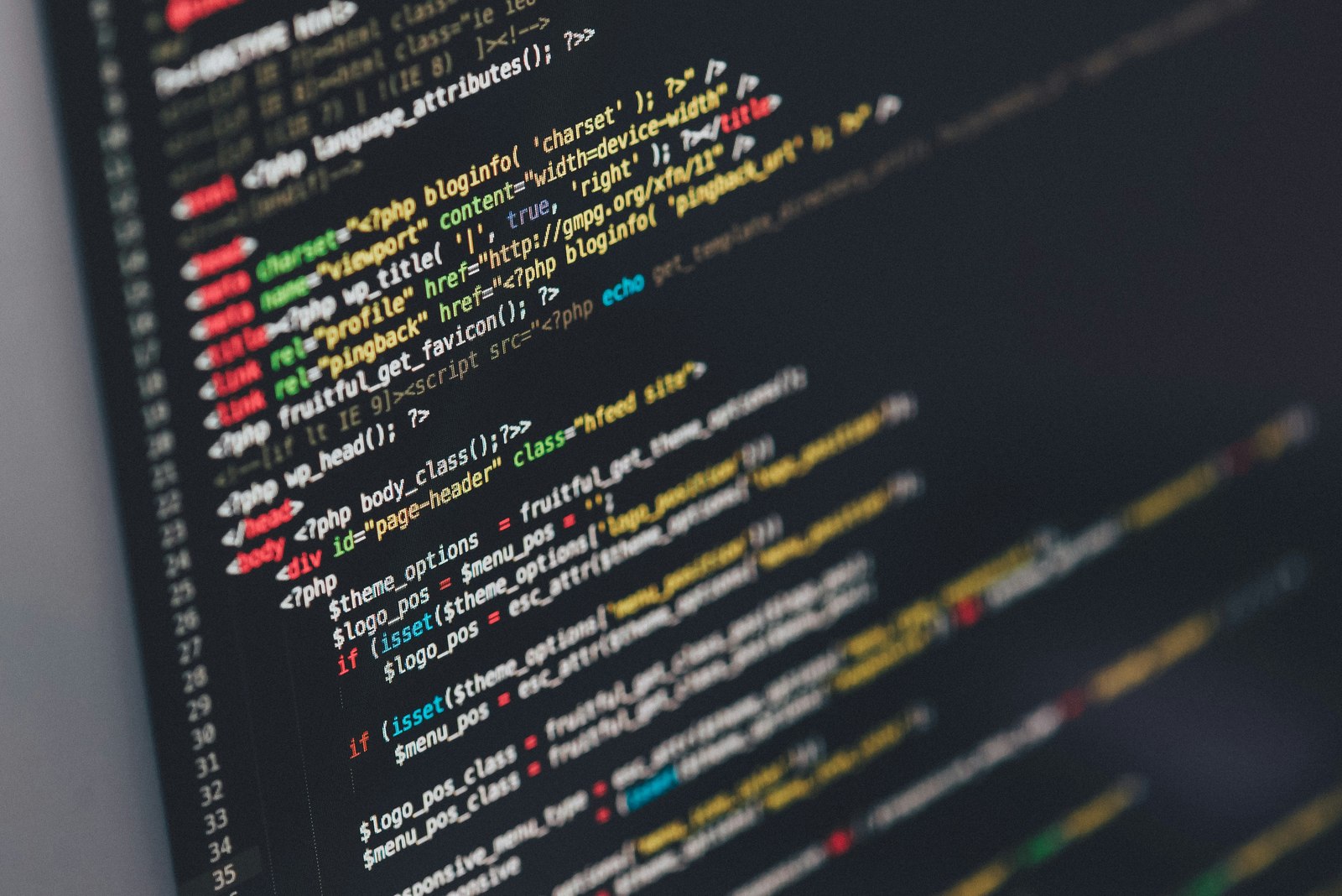 Close-up of source code on a dark screen